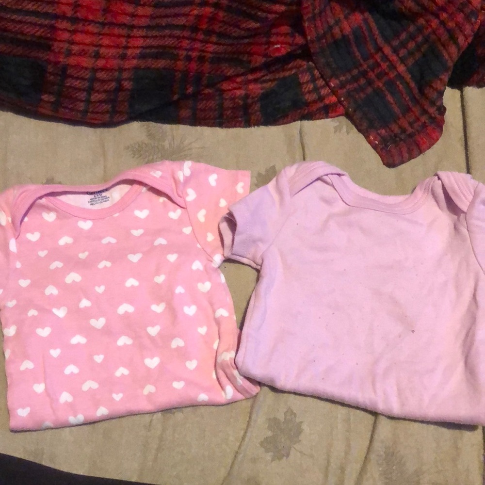 Pink heart onesie and purple onesie